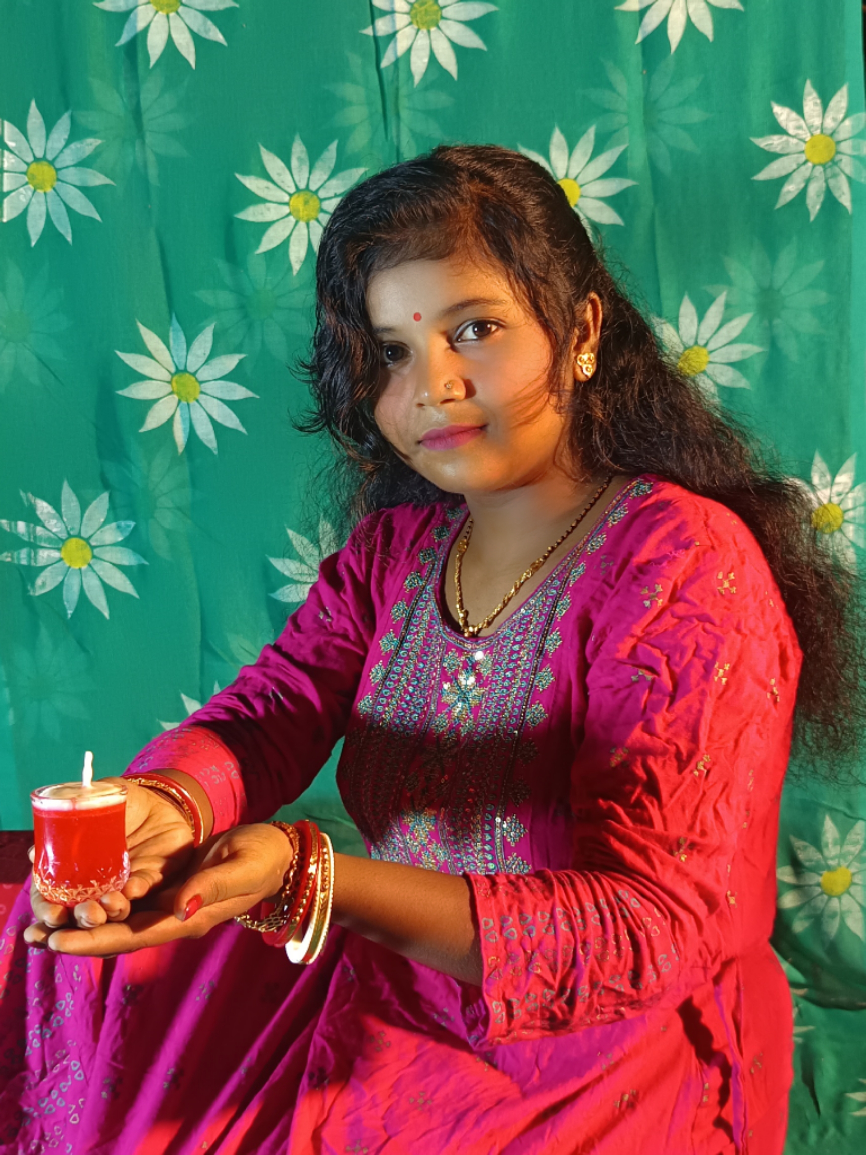 Indian girl with a candle in hand